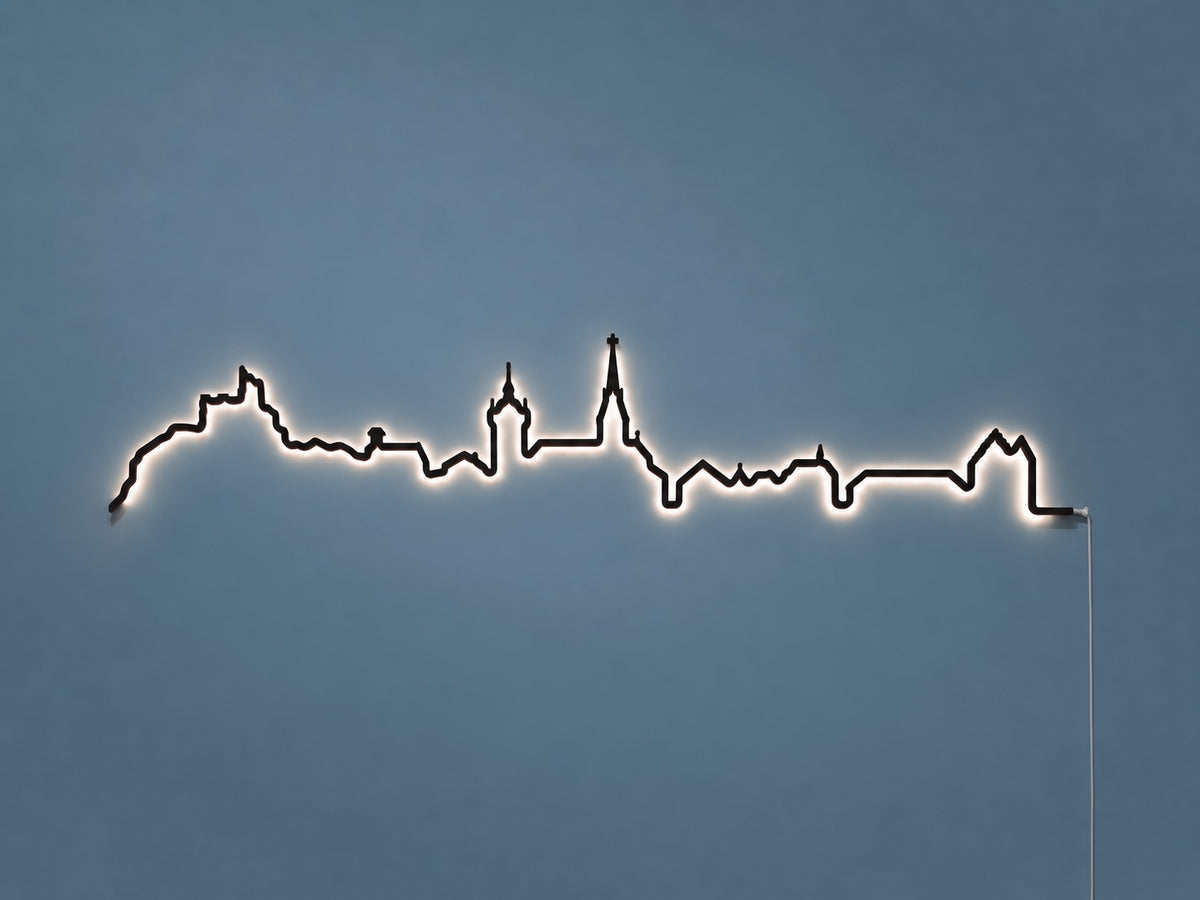 Kontura Skyline Baden in Schwarz, beleuchtet an der Wand #Farbe_Schwarz